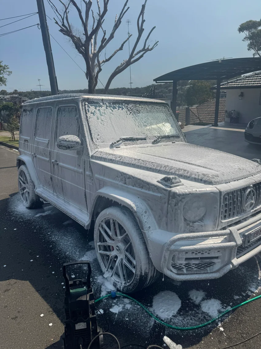Mercedes G-Class during a snow foam wash